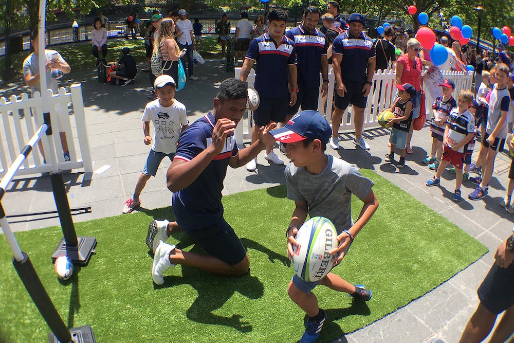 Rebels Player playing games with little kid 